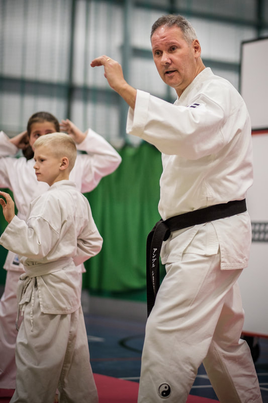 Sensei Andrew Chellew teaching karate